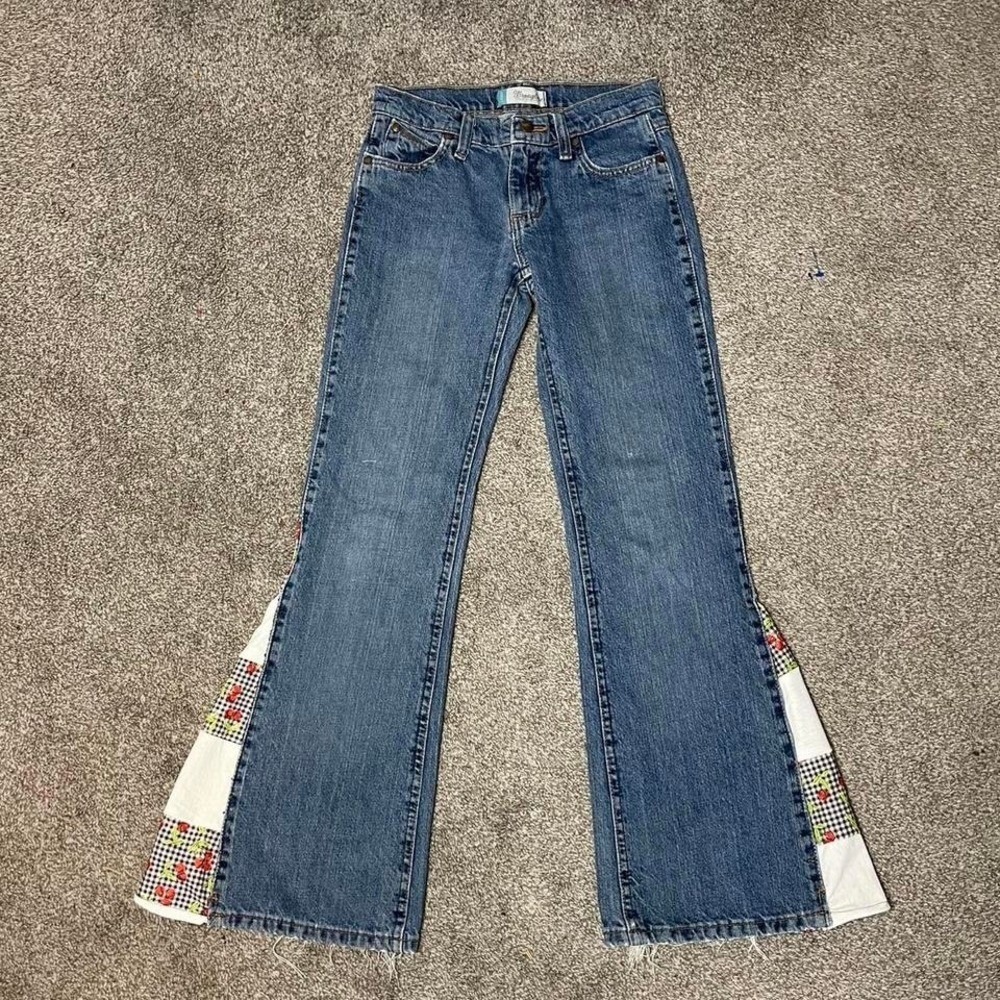 custom reworked Wrangler blue denim patchwork flare jeans w/ white+cherry print